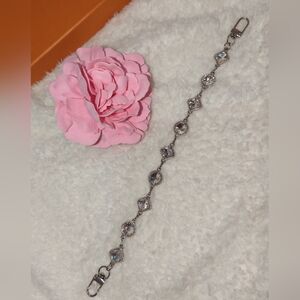 Silver Crystal-Link Bracelet with Pink Accent Flower
